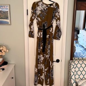 Long sleeve brown/olive green jumpsuit.